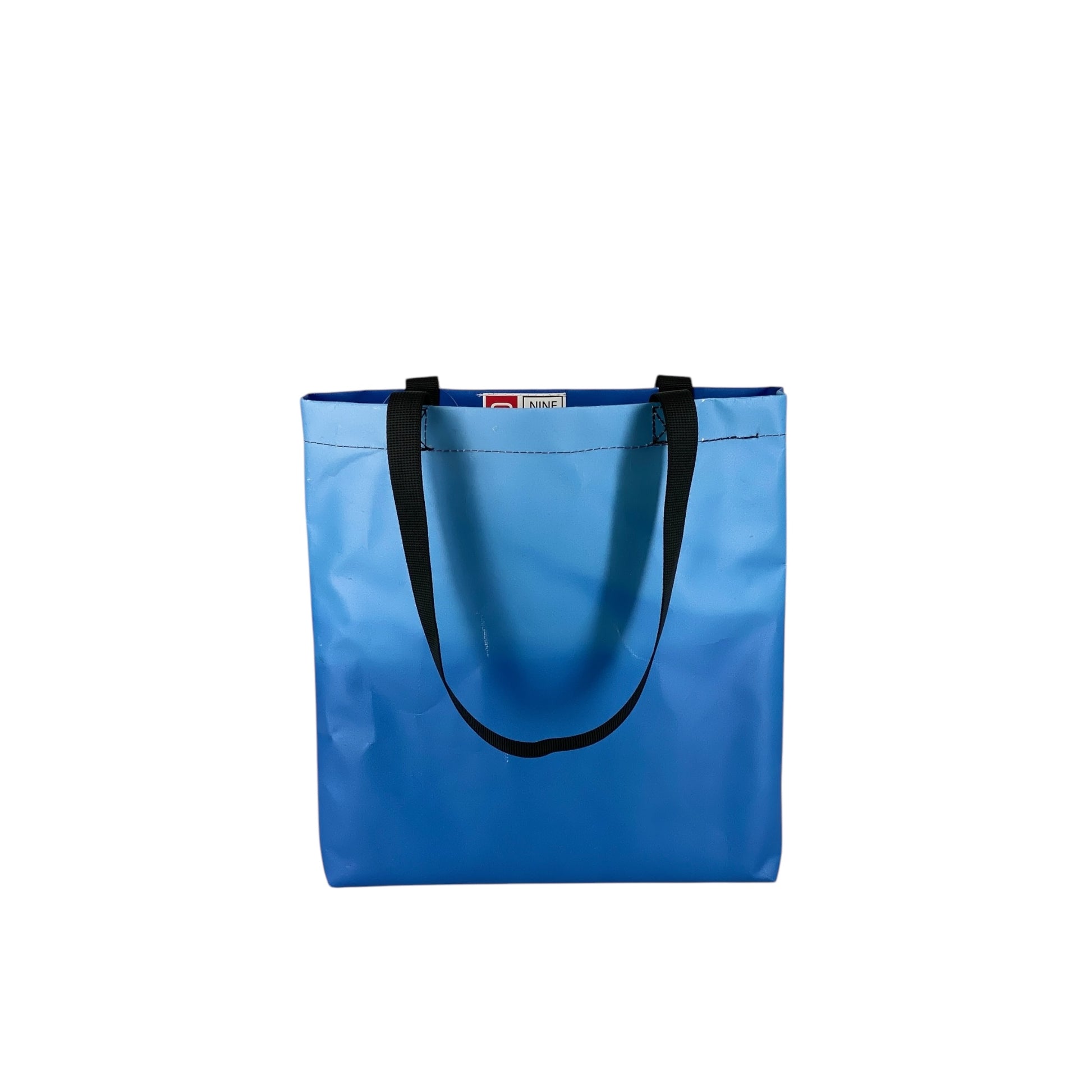 nine June, bâches, camion, suisse made, recyclage, upcycling, shopper, sac, tote bag, sac à dos, backpack,backpacks. lausanne sports, ls